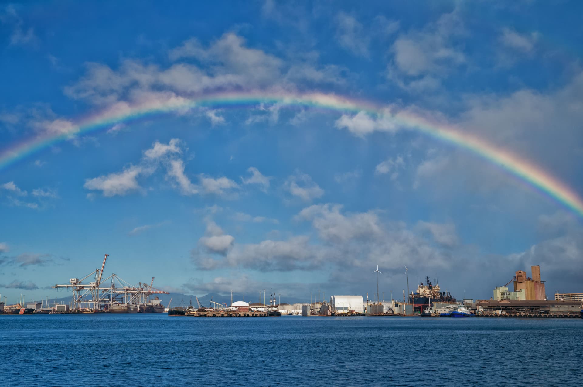 rainbow over the ocean in honolulu Oahu