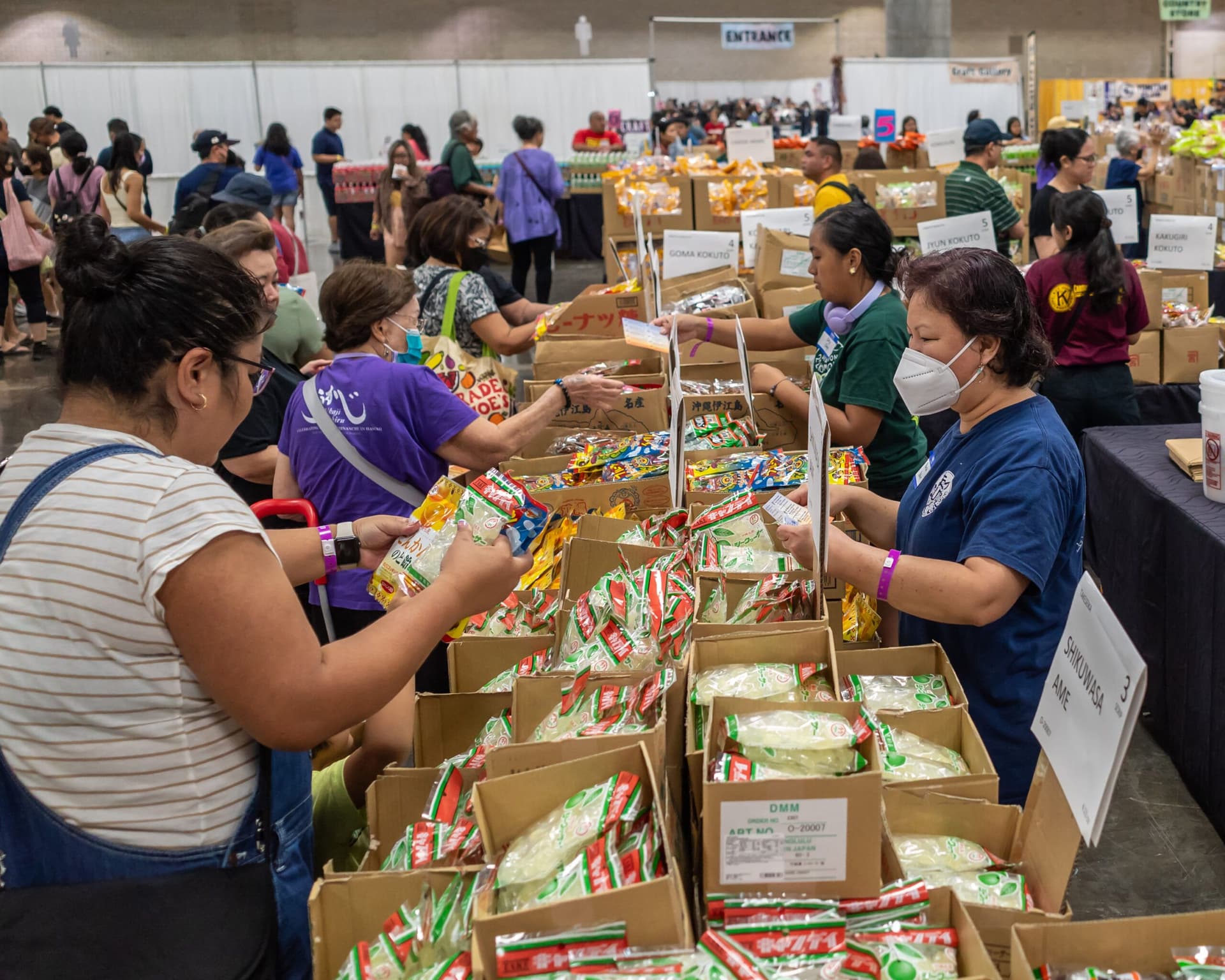 people shopping for okinawan food at 41st okinawan festival on oahu in honolulu.