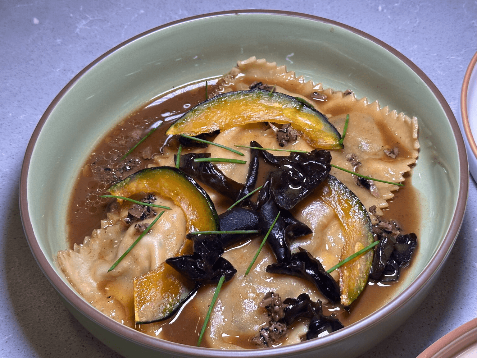 “Canh Bí Đỏ” Epaulettes. Photo by Sarah Burchard.