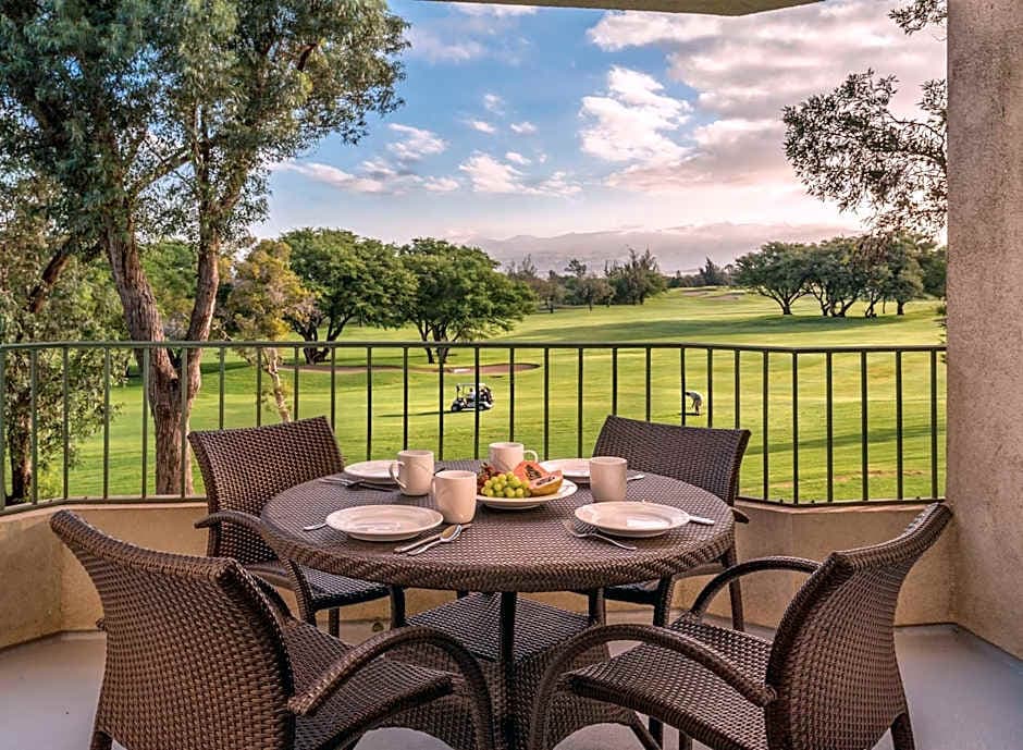 Hotel patio table overlooking a golf course