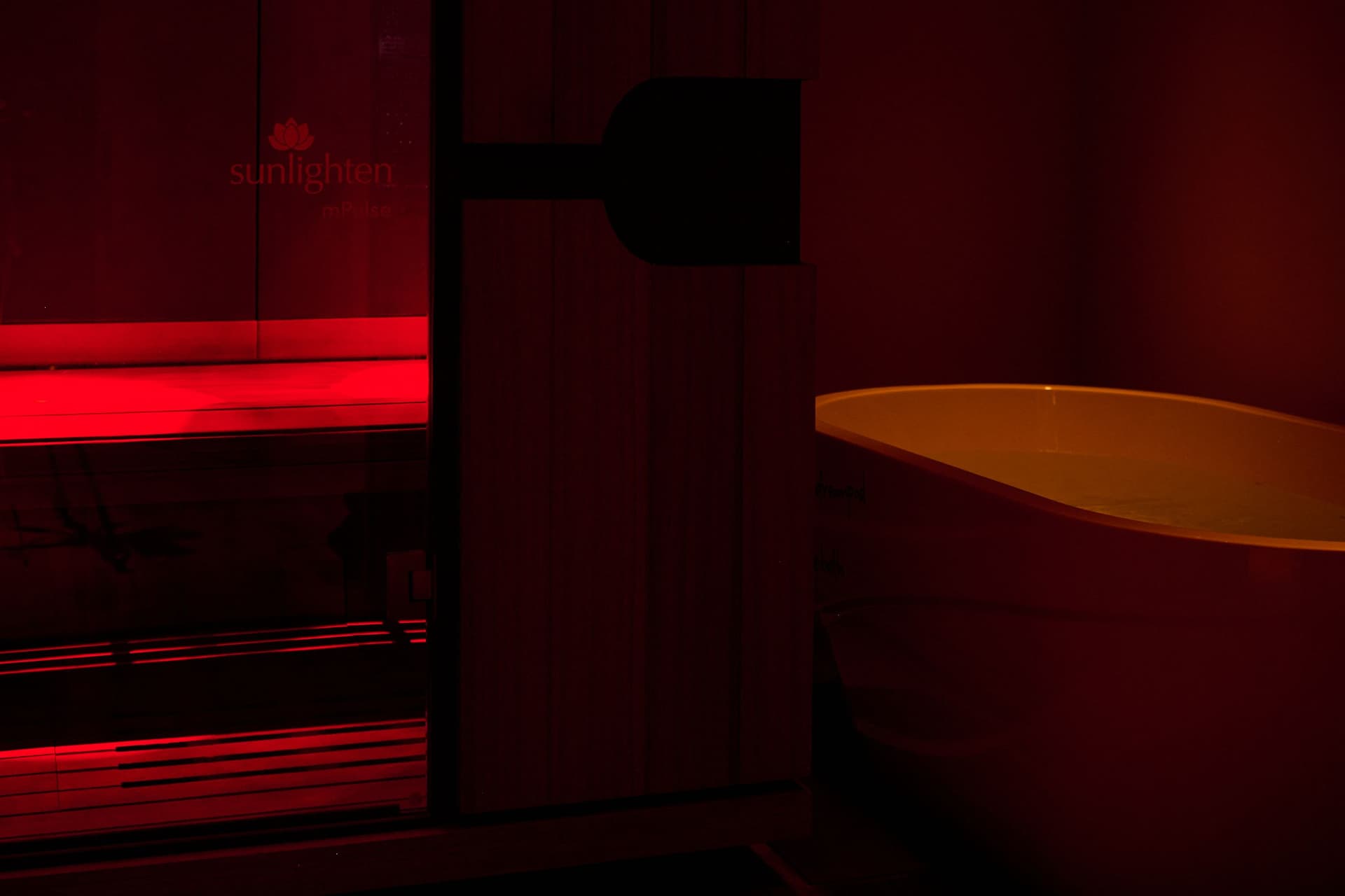 Red light therapy and cold plunge tub.