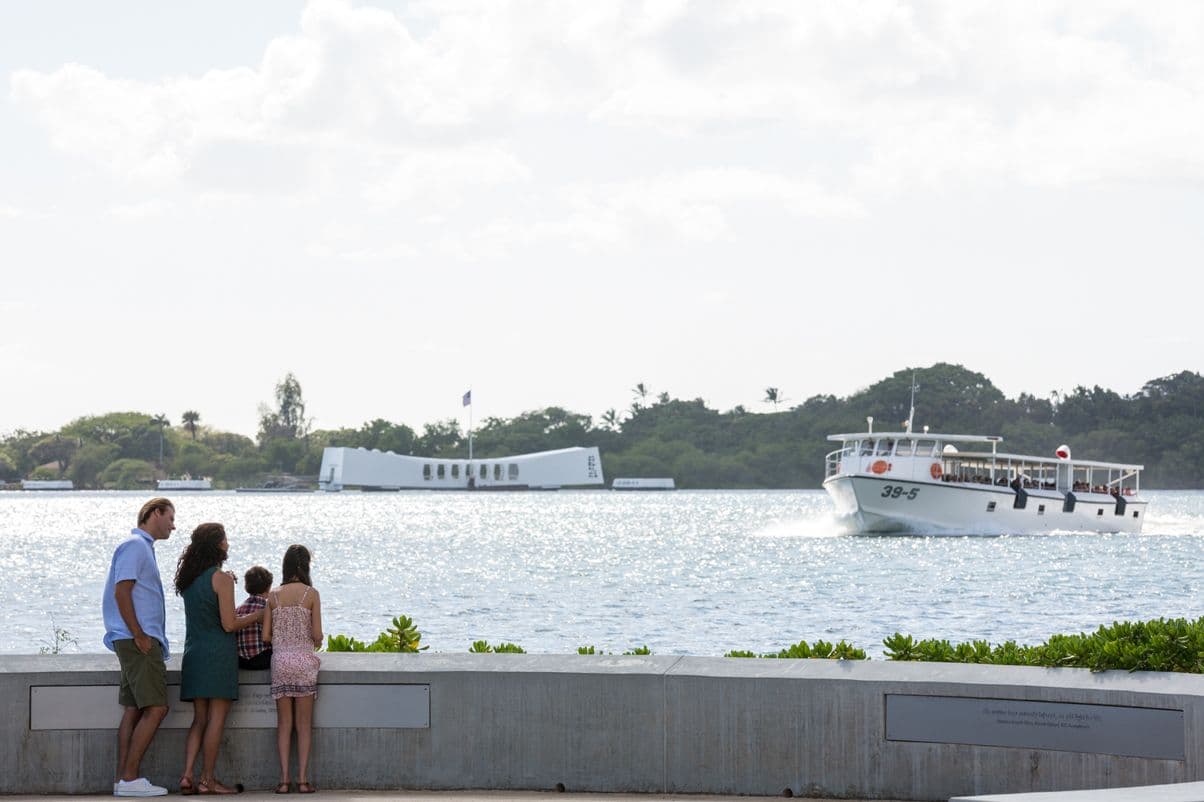 Family waiting for the ferry to go to USS Arizona at Pearl Harbor in Honolulu, Hawaii.