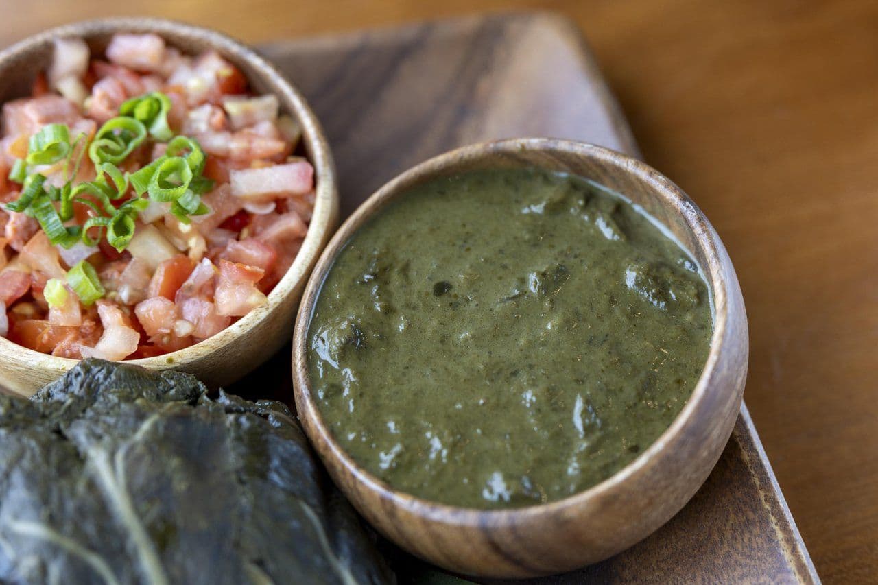 Squid lūʻau (right). Photo by Marco Garcia.