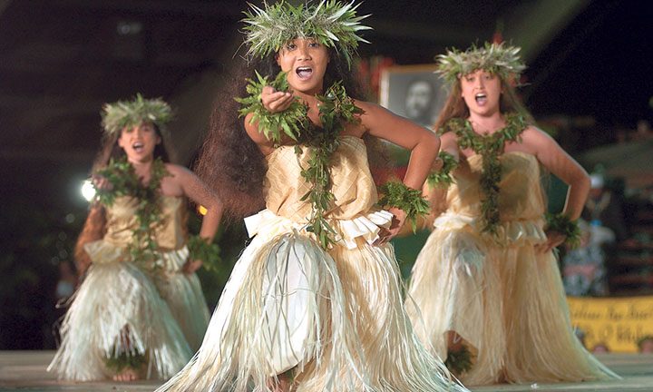 Keolalaulani Halau 'Olapa O Laka (Wahine, Kumu Hula Aloha Dalire) from He'eia, Kane'ohe, O'ahu, performs during the Kahiko portion of the hula competition at the 42nd Annual Merrie Monarch Festival. PHOTO BY DENNIS ODA. APRIL 1, 2005.