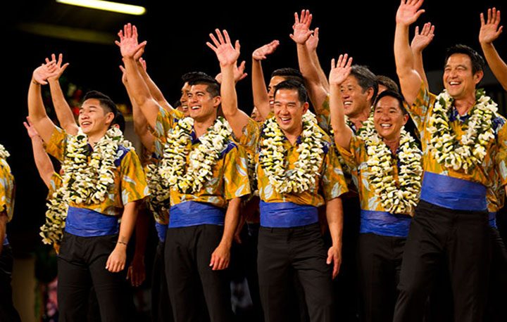 The kane from Na Kamalei (Kumu Hula Robert Uluwehi Cazimero; Honolulu, Oahu) dance during the AUANA portion of the Merrie Monarch Festival competition.  PHOTO BY DENNIS ODA.  APRIL 10, 2015.