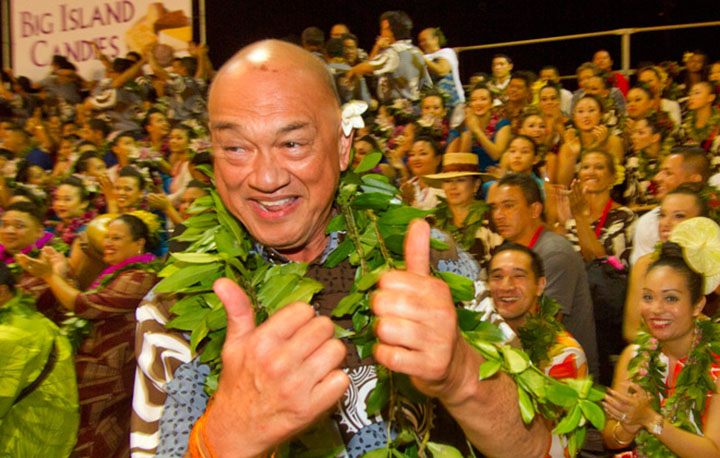 The winners of the 52nd Annual Merrie Monarch Festival hula competition were: Wahine Kahiko: Hula Halau O Kamuela; Wahine Auana: Halau Hula Ka Lehua Tuahini; Wahine Overall: Hula Halau O Kamuela. Kane Hahiko: Ka Leo O Laka I Ka Hikina O Ka La; Kane Auana: Halau Na Kamalei O Lililehua; Kane Overall: Halau Na Kamalei O Liliehua; Overall Winner: Halau Na Kamalei O Liliehua. This is Kumu Hula Robert Uluwehi Cazimero giving the two thumbs up walking toward the stage after it was announced he had won the Kane Overall. He was the Overall Winner also. Joining him walking to the stage to accept the award is Alvin Hanzawa who is at the top age limit to compete so this is the last time for him. PHOTO BY DENNIS ODA. APRIL 10, 2015.